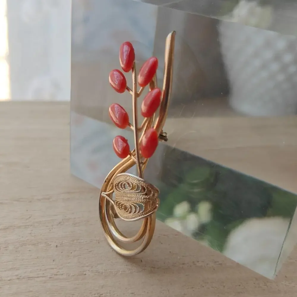 Vintage dark coral and gold tone floral spiral brooch